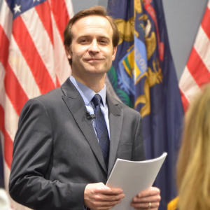 Brian Calley with Flags